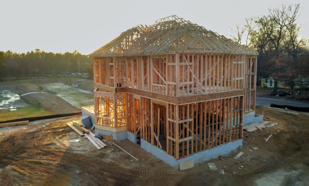 New house under construction exterior framing joist and beam